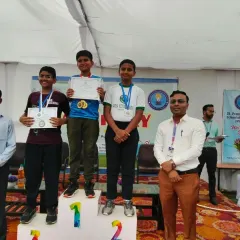 Our male archers also consistently perform at a high level. Here, they are recognized for their excellent performance in a competitive archery event.