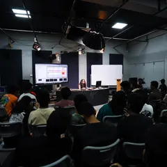 Leading a masterclass at Seamedu, where I break down my music production process for a room full of aspiring artists. I focus on making these sessions engaging, with plenty of time for interaction and Q&A.