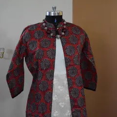 I love layering, and this poly-silk printed jacket paired with a simple Kota Doriya kurta is a perfect example of chic Indo-Western styling. It's a versatile combination that can be dressed up or down for any occasion.