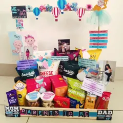 This hamper is packed with snacks and treats to help parents-to-be through their pregnancy. I also include personal touches like photos of the couple to make it extra special.