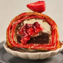 The strawberry edition of our Signature Croissant Cake is a seasonal favourite. We fill a red-striped croissant with chocolate cake, mascarpone, and a fresh strawberry compote made from Mahabaleshwar strawberries.