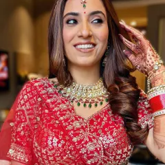 This bride glowed from her sundowner pheras to her starlight reception. We created a look with smoked-out brown eyeshadow, a hint of glitter, and a flawless base that lasted through hours of dancing.