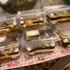 My Twixter dessert, packed in individual containers. It's a convenient way to enjoy this creamy, chocolatey treat.