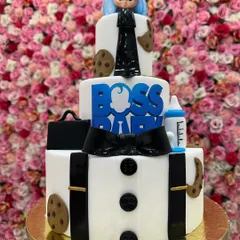 For the little boss in your life, this three-tiered Boss Baby themed cake is a showstopper. I used fondant to create sharp details like the suit, tie, and briefcase, making it a hit at kids' birthday parties.