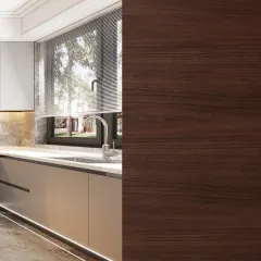 This view highlights the clean lines of the handleless cabinets, the under-cabinet lighting, and the beautiful contrast between the warm wood and cool marble floor.