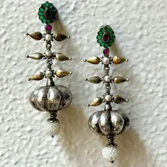 Can anything be more beautiful than pure silver Indian earrings? This pair features a unique tiered design with pearl drops, combining oxidised and polished silver for a striking look.
