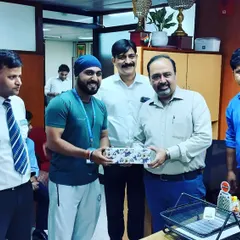 Receiving a token of appreciation after a successful yoga event at IOCL Yusuf Sarai. It is an honor to connect with teams and share the practice of yoga.