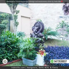 For the Manekshaw Centre, I undertook a large-scale landscape redesign and maintenance project. This image shows a Ganesha statue beautifully integrated into a lush garden bed with a variety of plants and textures.