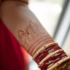 Another angle of the beautiful stain, this time showing the "Hollywood" design on the other arm, representing the bride's dreams. The color is deep and even.