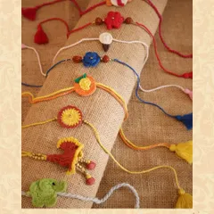 A colourful array of 100% cotton handmade Rakhis, featuring quirky and cute designs from animals to ice cream cones.
