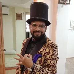 A candid shot wearing my top hat. They say there is no age for love, but there is love in every age. For me, that love is magic.