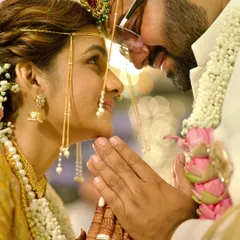 The beauty of tradition lies in its quiet moments. This close-up from a Marathi wedding captures the gentle intimacy and deep respect between the couple during a sacred ritual. We believe these are the frames that hold the most emotion and become timeless memories.