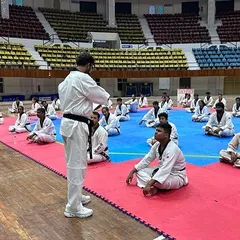 Instructing a group of attentive participants at the National Kyorugi Referee Seminar in Cuttack, Odisha. Continuous learning is essential for the growth of Taekwondo officials.