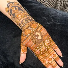 The beautiful henna stain of the royal procession design, showing how the color develops.