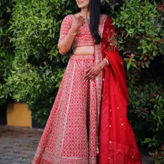 The complete reception look, showing how the hair, makeup, and lehenga come together for a show-stopping effect.