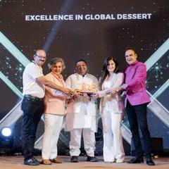 Our team accepting the Gold award for 'Excellence in Global Dessert' at The Gourmet Fest. This win celebrates our innovation in bringing international dessert concepts to the Indian market.