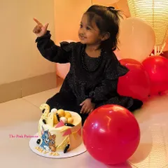 This little girl's smile says it all! Enjoying her Tom and Jerry themed birthday party.