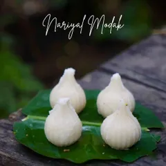 The classic Nariyal Modak, filled with a sweet and fragrant coconut stuffing. It's a traditional favourite for a reason.