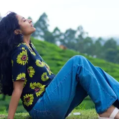 Relaxing in the lush green tea plantations of Munnar, Kerala. This image showcases a calm, natural vibe suitable for lifestyle and travel campaigns.