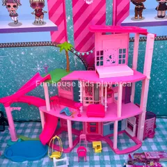 A detailed look at the Barbie Dream House rental, complete with a slide, pool, and furniture. It's a dream come true for any Barbie fan.