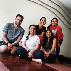 The energy in my in-person workshops is something special. This is us after an arm balance session in my Powai studio. We fall, we laugh, we support each other, and we all leave a little stronger and more confident. This is our community.