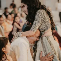 A deeply emotional and tender moment between a bride and her father. This powerful image captures the love, connection, and bittersweet feelings that are part of a wedding day.