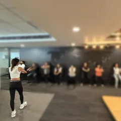Leading an office workout. My goal is to make fitness accessible and show people that you can get a great workout anywhere, anytime.