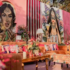 Let's make your Mehendi pop! 🎨 For this celebration, I used bold, custom pop-art caricatures to create a backdrop that was as vibrant and unique as the couple. Paired with plush seating and eclectic cushions, it’s a perfect example of how I infuse personality into every corner.