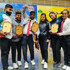 With my friends and fellow coaches. Our bond goes beyond the Taekwondo mat.