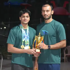 Coach Virdhawal Khade with record-breaking champion Shubhankar Patki. This partnership between elite coach and dedicated athlete is where victories are forged.