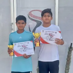 Yashas and his competitor showcase their trophies after the U-14 Talent Series. Yashas fought through the qualifying rounds to emerge as the champion, demonstrating incredible determination.
