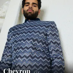 This kurta features a bold chevron weave in shades of blue and silver. The rich texture and unique pattern make it a statement piece for any festive occasion.