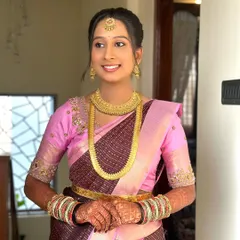 A happy bride-to-be. Her smile is the best accessory. The makeup is designed to be light and comfortable for long hours of rituals and celebrations.