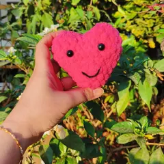 A fun and sweet version of our crochet heart, complete with a little smile. This plushie is a cheerful and adorable keepsake that is sure to make anyone happy.