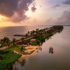 This is the magic of the Karavali coast from a perspective few get to see. An aerial drone shot captures the dramatic meeting of land and sea near Udupi, with a narrow strip of earth separating the calm backwaters from the vast Arabian Sea under a colourful sunset.