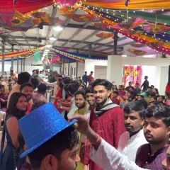 The 'Musical Hands' game in full swing at the Vyapar Diwali celebration. I love introducing new and interactive games that get everyone, including couples and teams, involved.