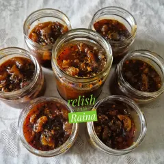 A batch of my sweet and sour amla pickle, showing the beautiful glaze from the sweet and tangy syrup. This pickle is perfect for those who enjoy a less spicy, more flavourful condiment with their meals.