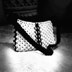 A moody, black and white shot of my baguette bag. I love how this highlights the beautiful patterns and the contrast of the design.