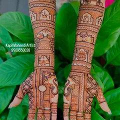 Your wedding story, told through mehendi. This design includes traditional Rajasthani elements like palace architecture, royal elephants, and beautiful peacocks, creating a complete baraat scene on the arms.