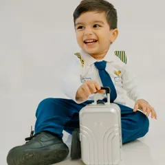 Ready for takeoff into a world of imagination! My themed sessions are all about bringing your child's dreams to life. With a wardrobe full of costumes like this tiny pilot's uniform, we can create a playful adventure they'll never forget.
