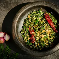 This is our special Cheera Poriyal, a vibrant and wholesome stir-fry made with fresh spinach and aromatic spices. Rich in nutrients, this dish supports detoxification and promotes overall well-being, proving that healthy food can be delicious.