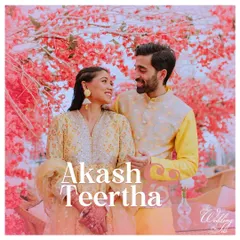 A picture-perfect moment. The couple shares a loving gaze against a stunning backdrop of pink cherry blossoms, a beautiful setting we created for their pre-wedding event.