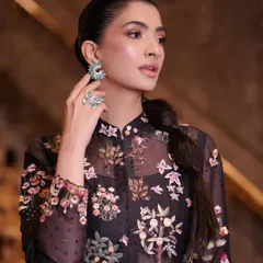 A close up of the sleek, sectioned ponytail I created for an attendee at India Couture Week. This hairstyle is modern, sharp, and complements the detailed outfit perfectly.