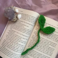 Here’s my leaf sprout tie being used as a bookmark. It’s gentle on the pages and looks super cute peeking out of your current read.