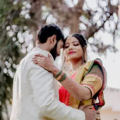 An embrace that says everything. I framed this shot to highlight the bride's beautiful saree and the couple's closeness, with the soft, natural background adding to the romantic feel.