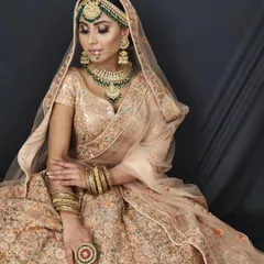 For a softer, pastel-themed wedding, I designed this elegant Kundan set with green beadwork. The choker, layered necklace, and matching earrings are customized to work beautifully with lighter-coloured outfits.