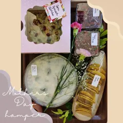 A thoughtful Mother's Day hamper featuring a delicious combination of our homemade Corn Spinach Quiche, Veg au Gratin, and crispy Taco Shells.
