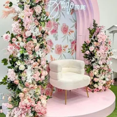 Celebrating the bride-to-be should be as beautiful as she is. This dreamy floral setup, with its cascading pink roses, elegant arch, and statement chair, creates a perfect, Instagram-worthy backdrop for a bridal shower or mehendi ceremony.