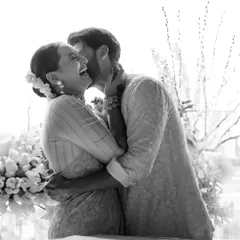A moment of pure joy and love as Sona and Zaheer embrace after their wedding ceremony. Shot in black and white, the focus is entirely on their radiant smiles and heartfelt connection.