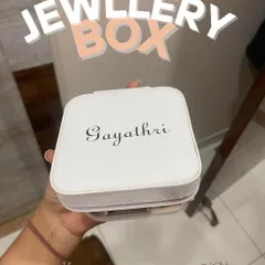 Keep your jewellery organized with a personalized travel jewellery box. This white box is customized with the name "Gayathri" in an elegant script, making it both practical and stylish.